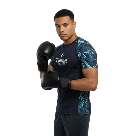 Person wearing a dark blue athletic shirt with a patterned design and black boxing gloves on a white background