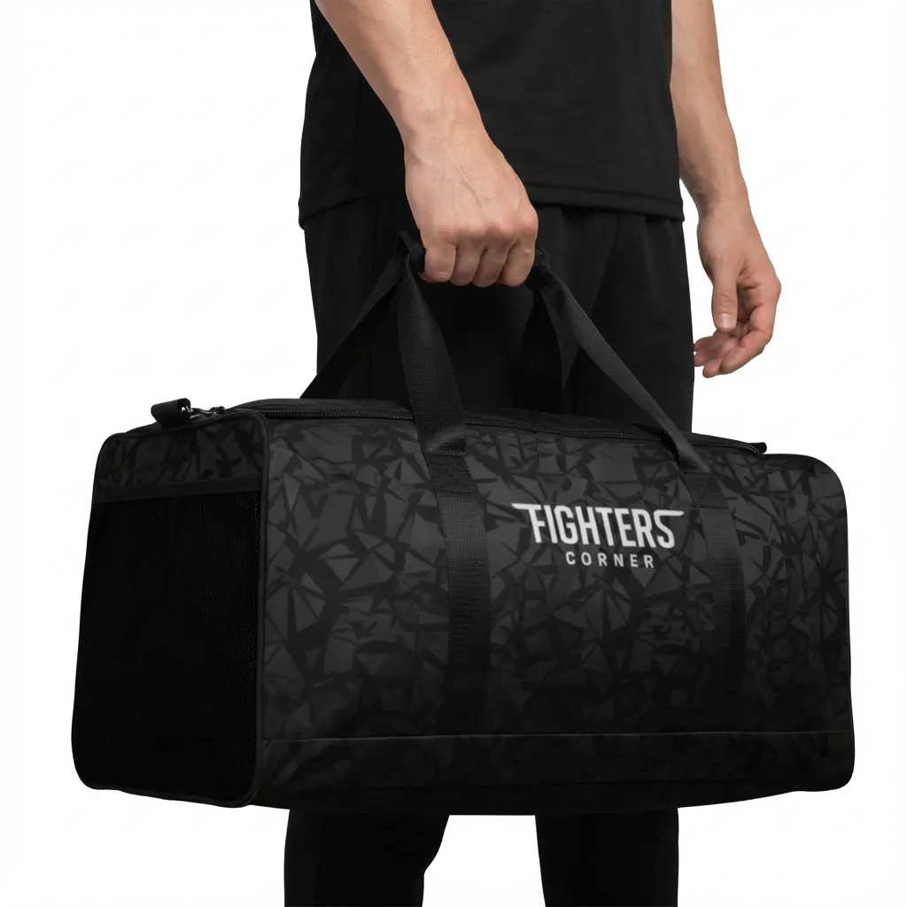 Person holding a black duffel bag with 'Fighters Corner' logo on a white background