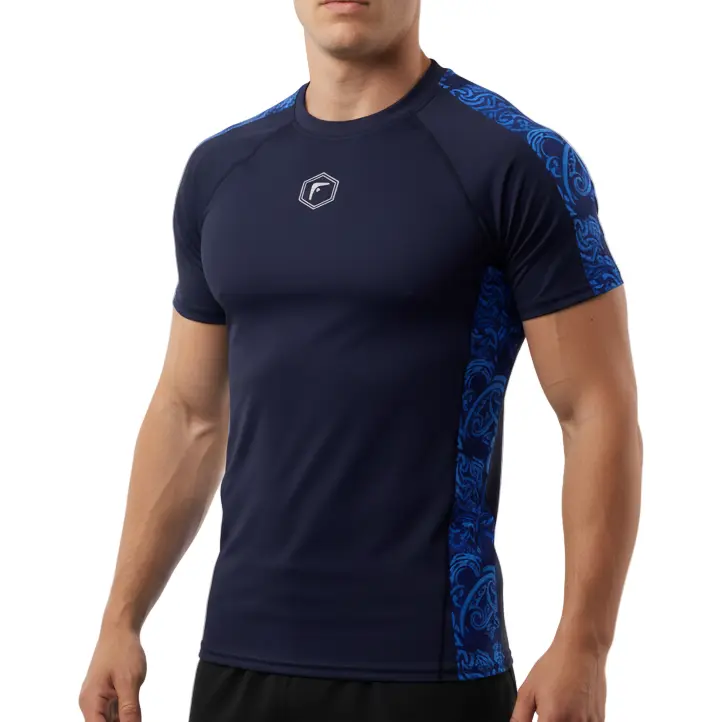 Person wearing a navy athletic  compression shirt with blue patterns on the side  on a white background