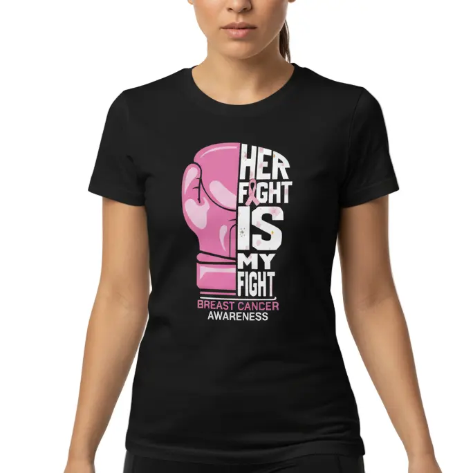 Woman wearing a Black “Her Fight Is My Fight” Breast Cancer Awareness t-shirt by Fighters Corner featuring a pink boxing glove graphic symbolizing strength and support.
