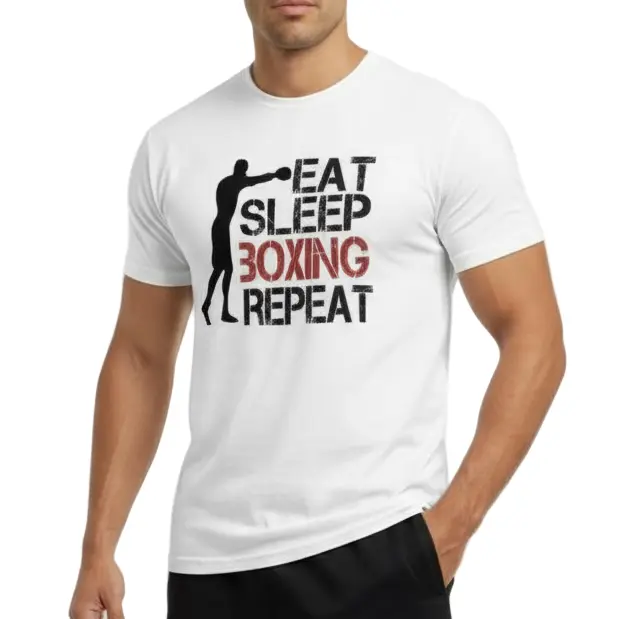 Front view of man wearing white 'Eat Sleep Boxing Repeat' T-shirt by Fighters Corner with black shorts.